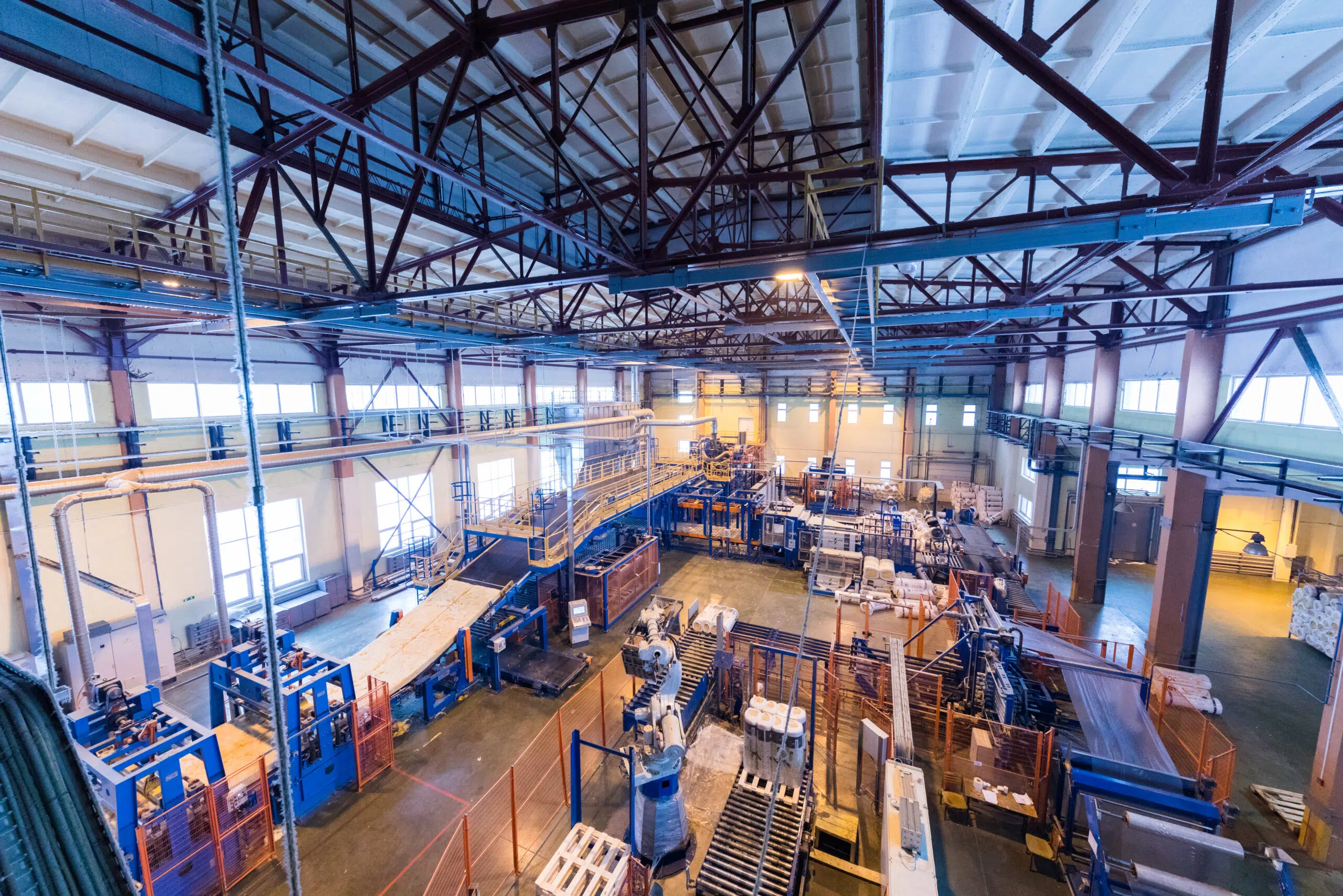 Vastu Consultation for Factory : Harmonizing Energies for Optimal Productivity Vastu Consultation for Factory : A factory floor with machinery, symbolizing the importance of Vastu consultation for factory efficiency.